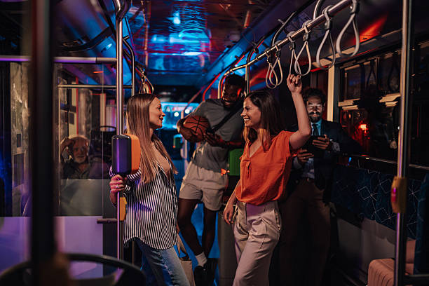 istock Young people having fun on night bus ride 2223114196