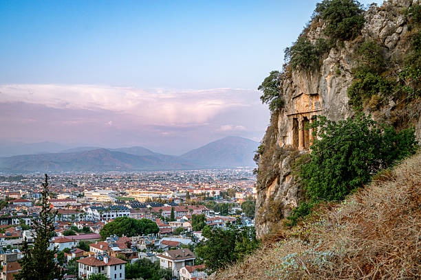 istock Amyntas grave with city view 2223114410