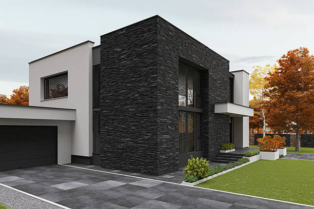 istock Modern Two-Story Villa with Black Slate Stone Facade and Spacious Yard in Autumn 2223117977