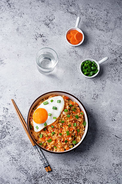 istock Vegetables fried rice with fried eggs, asian food 2223119616