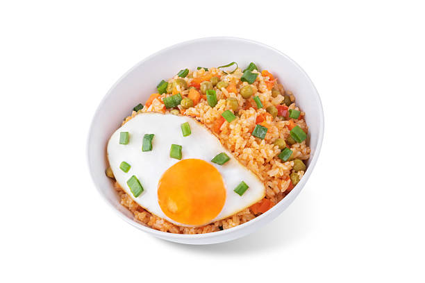 istock Vegetables fried rice with fried eggs, asian food on a white isolated background 2223119635