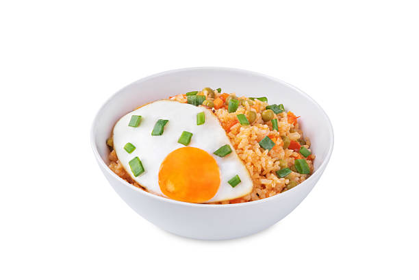 istock Vegetables fried rice with fried eggs, asian food on a white isolated background 2223119638