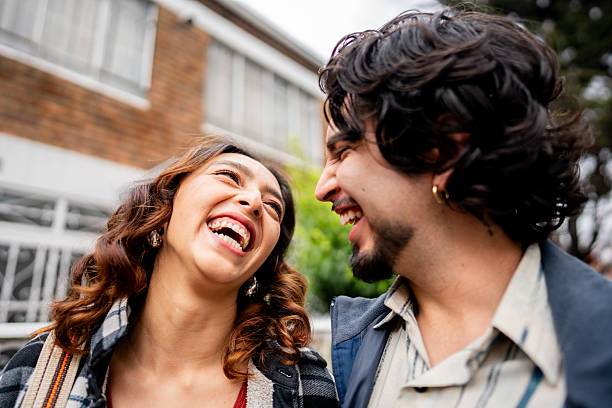 istock Happy couple talking on the street 2223120131