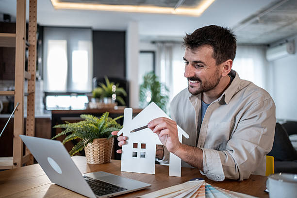 istock Architect presenting a new house project during a video call 2223122543