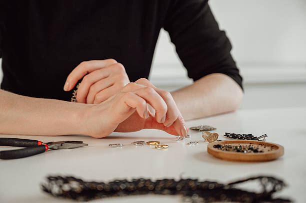 istock Handmade creative hobbies concept. Jewelry master setting table for tatting accesories 2223131318