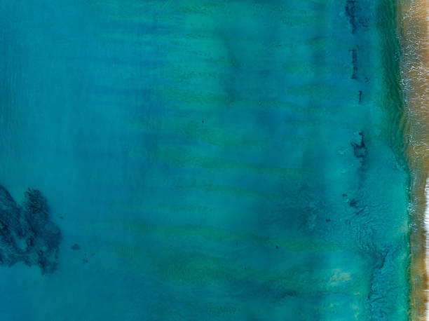 istock Aerial view sea surface waves texture nature background 2223132101