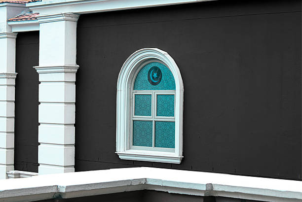 Islamic Window on Dark Exterior Wall
