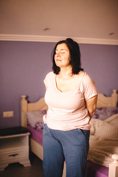 istock Woman meditating in the bedroom while waking up 2223132439