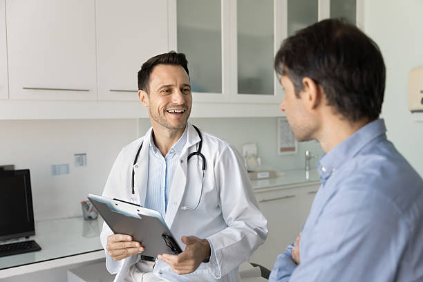 istock Cheerful optimistic doctor giving consultation to patient 2223140716