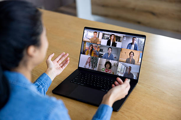 istock Woman talking on a video call with her team while working at home 2223141316