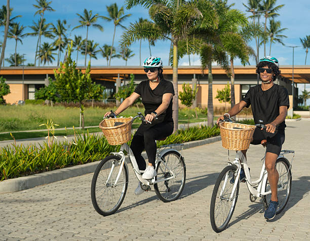 istock Friends cycling in a leisure area 2223144810