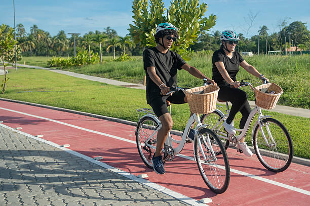 istock Friends cycling in a leisure area 2223144820
