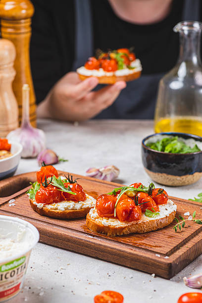istock Bruschetta with ricotta and baked tomatoes 2223150517