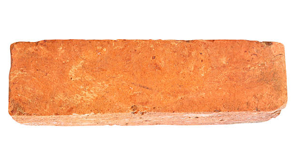 istock Single old red or orange brick isolated on white background. with clipping path 2223152751