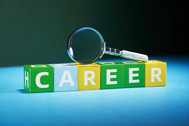 istock toy blocks with text career and magnifying glass. 2223155190