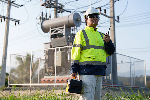 istock An expert engineer is inspecting a high-voltage transformer in a remote rural area.(Photo) 2223163101