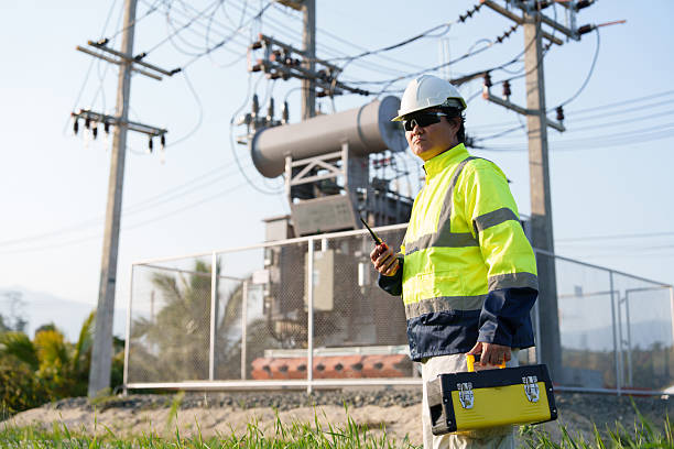 istock An expert engineer is inspecting a high-voltage transformer in a remote rural area.(Photo) 2223163135
