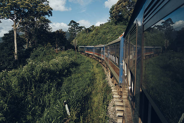 istock Train traveling through lush Vietnamese countryside 2223164423