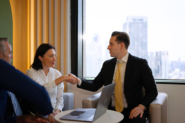 istock Group of white collar workers are working and meeting at office. 2223173209