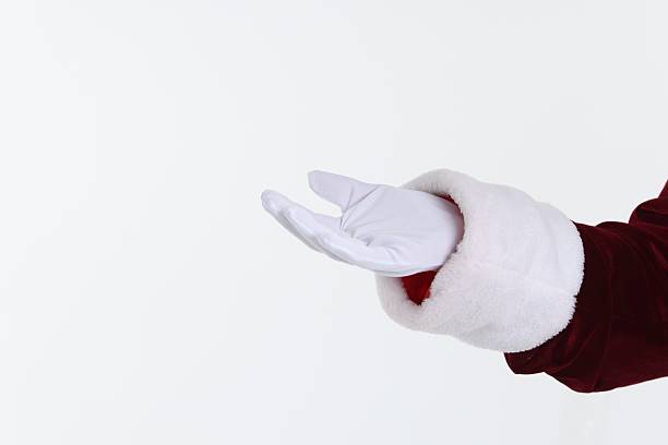 istock Santa Claus holding something on white background, closeup. Space for text 2223173408