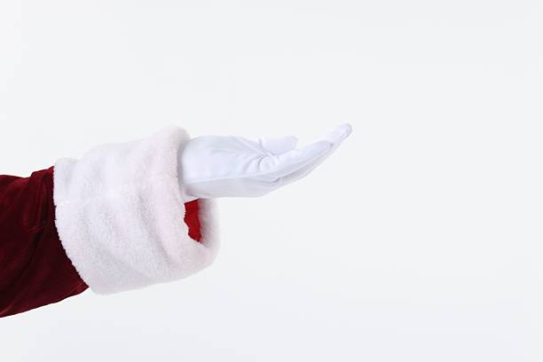 istock Santa Claus holding something on white background, closeup. Space for text 2223173477