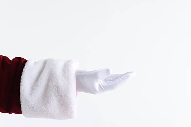 istock Santa Claus holding something on white background, closeup. Space for text 2223173479