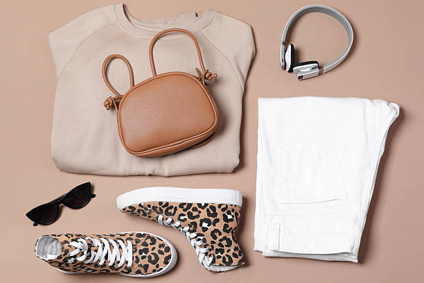 istock Stylish outfit with bag on brown background, flat lay 2223174200