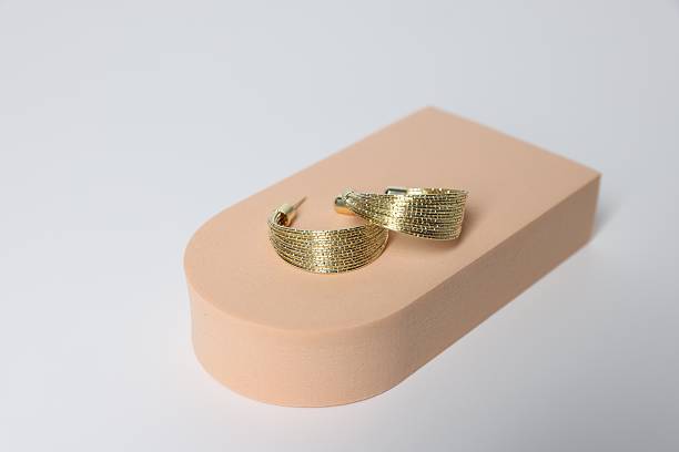 istock Stylish presentation of beautiful earrings on light background 2223174240
