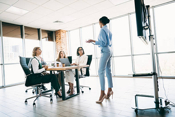 istock Professional business meeting with diverse team collaborating in modern office workspace motivated by teamwork and productivity 2223176306