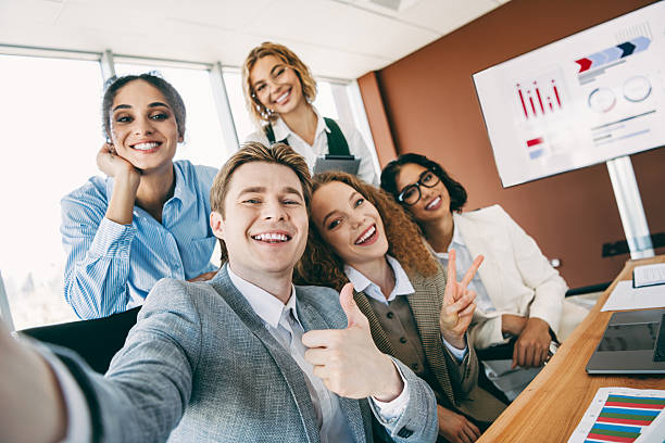 istock Professional team enjoying a casual office meeting in a workspace setting, showcasing teamwork and collaboration among coworkers 2223176315