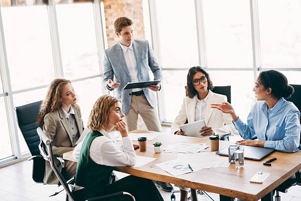 istock Professional Team Collaborating in Modern Office Setting to Discuss Business Strategies and Plans 2223176400