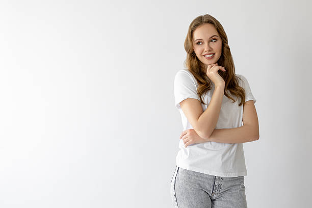 istock Pretty female posing against white background 2223176884