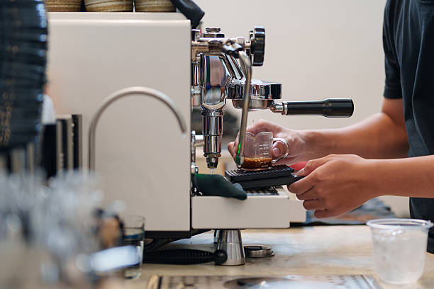 istock Barista pulling a fresh espresso shot at cafe 2223178972