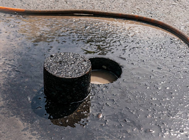 istock cylinder of asphalt road that is core drilled 2223179662