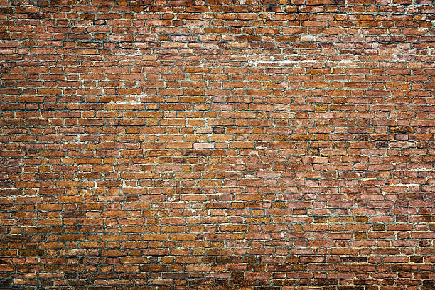 istock loft background of red stone blocks, rustic brick wall 2223179671