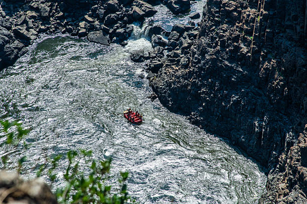 Antalya, Türkiye - October 15, 2013 : While the tourists rafting in the canyon are moving, the camera moves in the same direction. Notes:  The Köprüçay River in the Köprülü Canyon National Park in Antalya's Manavgat district is an exciting geography where rafting can be done.