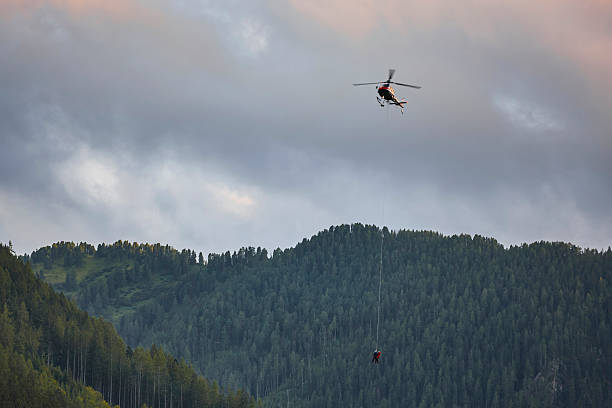 istock Helicopter rescue training simulation in a mountain range wood. Accident 2223182996