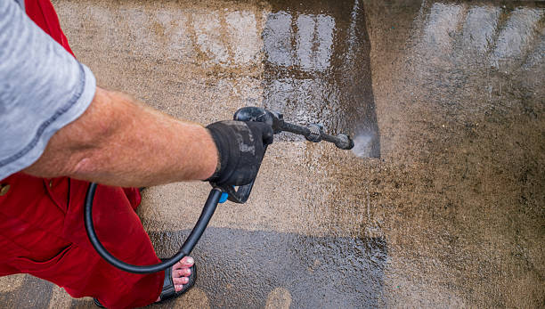 istock Close up cleaner using a water pressure machine, cleaning the cement floor. 2223187012