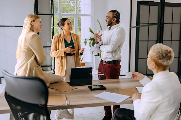 istock Coworkers discussing project during office meeting 2223189135
