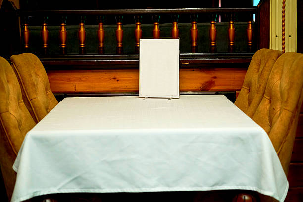 istock A table in a cafe, ready to receive guests, visitors 2223193935