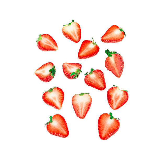 istock Slices of strawberry isolated on white 2223194389