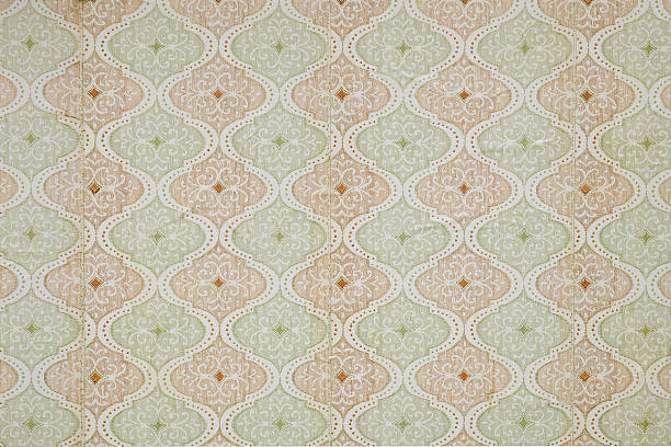 istock Old wallpaper on the wall. Old wallpaper for texture or background. 2223199793