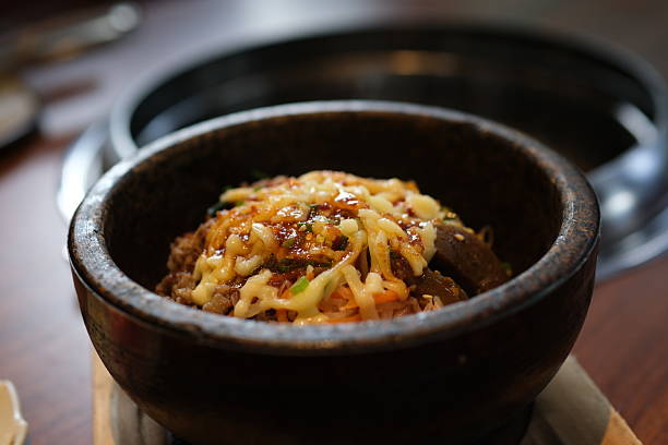 sliced beef on topped rice bowl with egg. High quality 4k footage