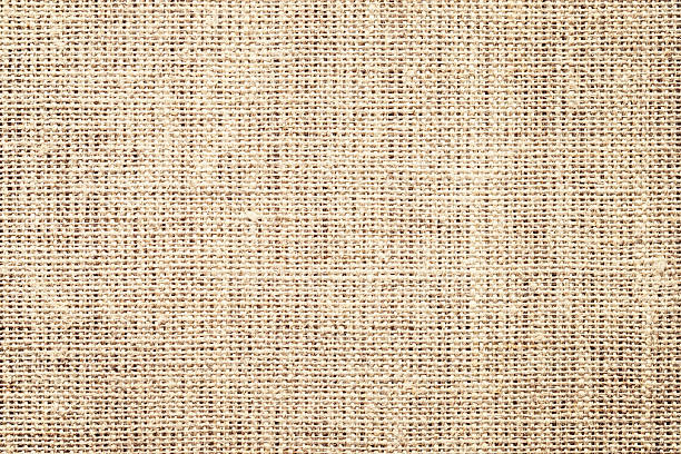 istock brown tablecloth from sackcloth as background. natural fabric texture 2223203220