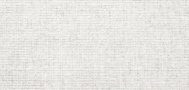 istock gray canvas with natural fabric texture. linen cloth as background. 2223203245