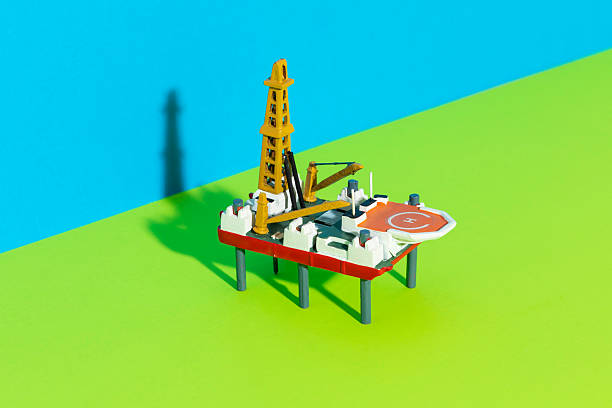 Oil derrick isolated over a white background. 3D render.