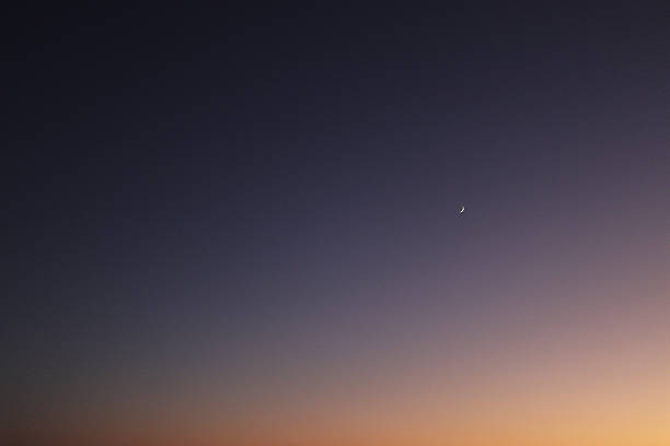 istock sunsSunset sky with the moon, minimalistic background with copy space 2223212065