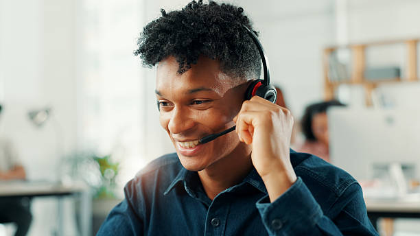 istock Consulting, smile and support with man in call center for assistance, help or lead generation. Communication, contact and mic with happy virtual assistant at work in customer service for feedback 2223215025