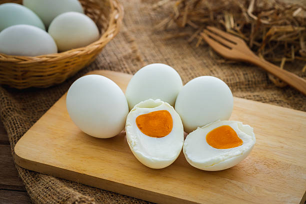 istock Salted duck eggs on wooden board 2223218531