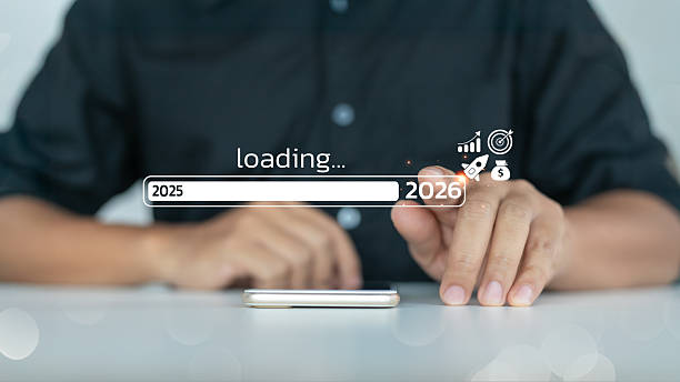 istock A man touching a digital loading bar progressing from 2025 to 2026, representing annual transition, business growth, future vision, and strategic planning. 2223218653